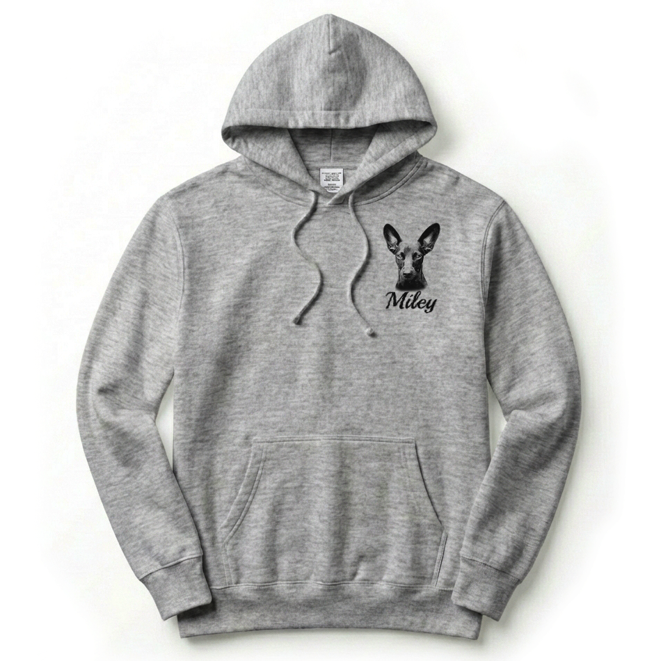 Gray hoodie with a dog graphic and text on a white background