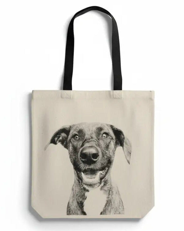 The Canvas Tote Bag carried on a shoulder