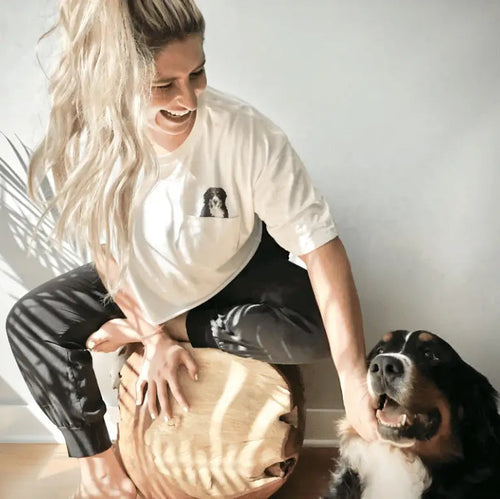 Woman wearing custom pet portrait pocket tee in black and white style