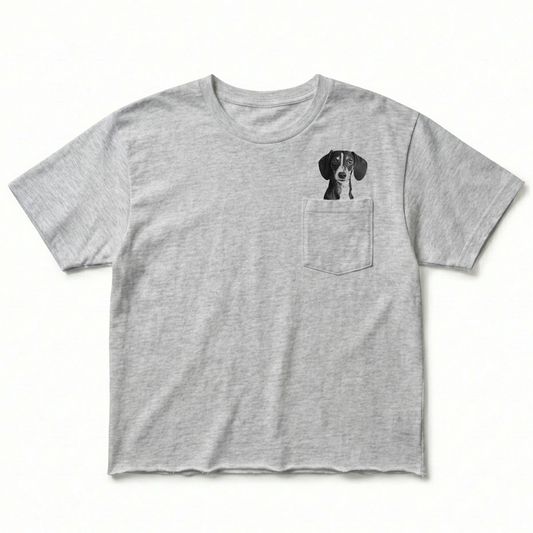Gray t-shirt with a dog graphic on a white background