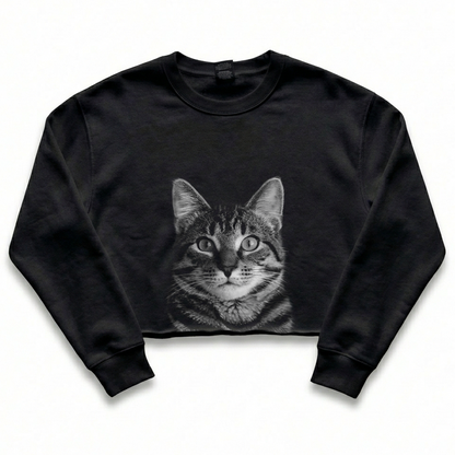 Black cropped sweatshirt with a cat graphic on a white background