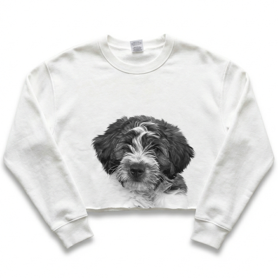White sweatshirt with a black and white puppy graphic on a white background