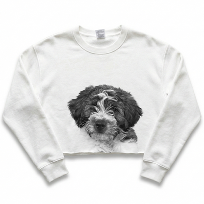 White sweatshirt with a black and white puppy graphic on a white background