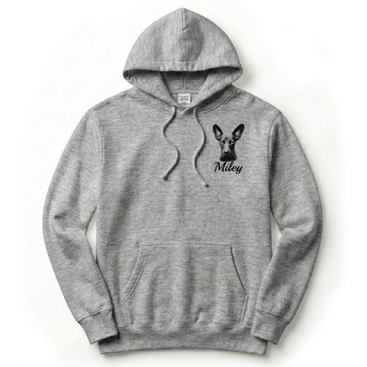 Gray hoodie with a dog graphic and text on a white background