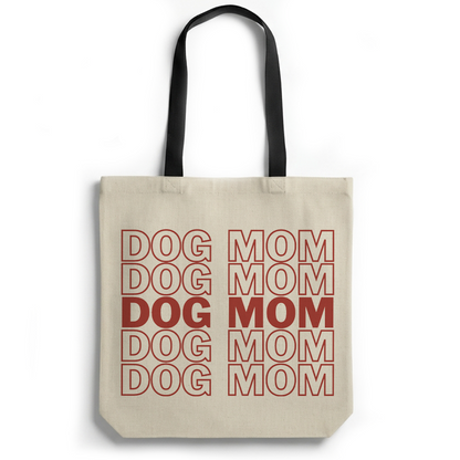 Beige tote bag with red text 'DOG DOG DOG MOM MOM MOM' on a white background