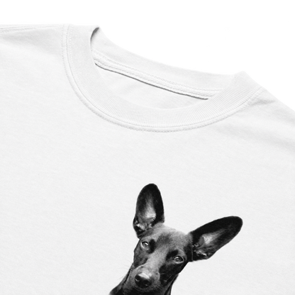 Close-up of a white crewneck t-shirt featuring a black and white graphic print of a dog's head on the front.