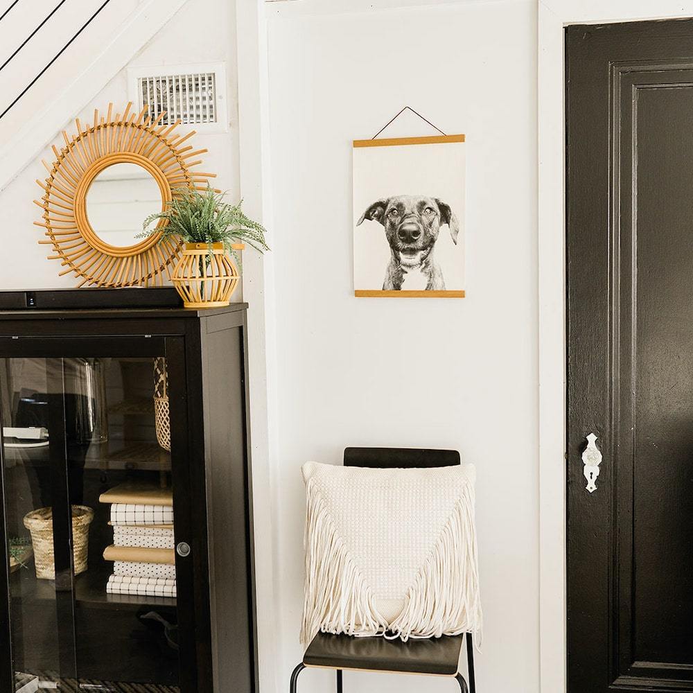 Lifestyle shot of hanging canvas in hallway
